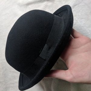 Black bowler hat